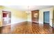 Sunny dining room featuring parquet floors, a hanging light fixture, and neutral walls at 1285 10Th Street Nw Blvd, Hickory, NC 28601