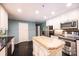 Spacious kitchen with white cabinets, stainless steel appliances, and a center island at 1285 10Th Street Nw Blvd, Hickory, NC 28601