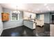 Inviting kitchen with white cabinetry, center island, and stainless steel appliances at 1285 10Th Street Nw Blvd, Hickory, NC 28601