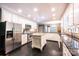 Bright kitchen featuring white cabinetry, stainless steel appliances, and a butcher block island at 1285 10Th Street Nw Blvd, Hickory, NC 28601