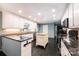 Spacious kitchen with custom cabinetry, a center island, and stainless steel appliances at 1285 10Th Street Nw Blvd, Hickory, NC 28601