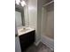 The bathroom is equipped with a tub and a stylish vanity at 1300 Braveheart Ln, Charlotte, NC 28216