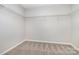 Walk-in closet with neutral carpet and wire shelving at 13816 Riding Hill Ave, Charlotte, NC 28213