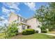 Charming home showcasing well-maintained lawn, vinyl siding, and manicured bushes at 13816 Riding Hill Ave, Charlotte, NC 28213