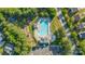 Aerial view of the community pool, playground, and surrounding greenery at 1707 Kashmir White Ln, Fort Mill, SC 29708