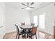 Cozy dining area featuring a wooden table set and natural light from nearby windows at 1707 Kashmir White Ln, Fort Mill, SC 29708