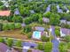 An aerial view of the neighborhood showcases the community pool and well-maintained landscaping at 17913 Ragtop Day Ln, Cornelius, NC 28031