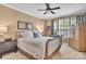 Cozy bedroom with a large window for natural light, complementing the neutral color scheme at 17913 Ragtop Day Ln, Cornelius, NC 28031