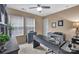 Functional home office with a sleek desk, ample storage, and natural light at 17913 Ragtop Day Ln, Cornelius, NC 28031