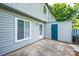 Backyard features a concrete patio with a side door at 1905 Mereview Ct # 21, Charlotte, NC 28210