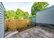Fenced backyard features a concrete patio and a yard at 1905 Mereview Ct # 21, Charlotte, NC 28210