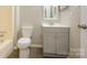 Bathroom with a sleek vanity, modern fixtures, and neutral decor at 1905 Mereview Ct # 21, Charlotte, NC 28210