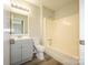 Clean bathroom includes a tub-shower, a toilet, and a vanity at 1905 Mereview Ct # 21, Charlotte, NC 28210