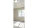 Sun-filled bedroom featuring neutral carpet, natural light, and a window at 1905 Mereview Ct # 21, Charlotte, NC 28210