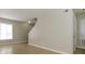Open living area featuring tile flooring and a neutrally decorated color palette with ample natural light, creating a welcoming space at 1905 Mereview Ct # 21, Charlotte, NC 28210