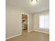 View of a living room featuring neutral tones, a window and tile flooring at 1905 Mereview Ct # 21, Charlotte, NC 28210