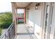Private balcony with metal railing, outdoor lighting, and a view of surrounding landscape at 2092 Ayrsley Town Blvd, Charlotte, NC 28273