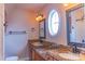 Well-lit bathroom with granite countertops and dual sinks at 2092 Ayrsley Town Blvd, Charlotte, NC 28273