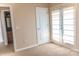 Bedroom with french doors and ensuite bathroom access at 2092 Ayrsley Town Blvd, Charlotte, NC 28273