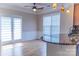 Bright dining area with wood floors, stylish lighting, and a door to the outside at 2092 Ayrsley Town Blvd, Charlotte, NC 28273