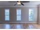 Spacious living room with hardwood floors, and natural light at 2092 Ayrsley Town Blvd, Charlotte, NC 28273