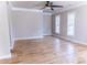 Large living room featuring hardwood floors, neutral walls and natural light at 2092 Ayrsley Town Blvd, Charlotte, NC 28273