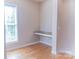 Cozy office nook with built-in desk, hardwood floors, and natural light at 2092 Ayrsley Town Blvd, Charlotte, NC 28273