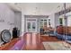 Spacious room with hardwood floors and natural light; features recreational equipment and access to an outside area at 2092 Ayrsley Town Blvd, Charlotte, NC 28273