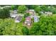 Aerial view of homes in a neighborhood with mature trees at 2212 Acme Rd, Belmont, NC 28012