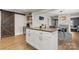 Bright kitchen with a center island, granite countertops, and sleek white cabinetry at 2212 Acme Rd, Belmont, NC 28012