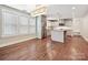 Modern kitchen and breakfast nook featuring stainless steel appliances and a kitchen island at 2323 Arden St, Charlotte, NC 28206