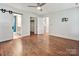 Spacious main bedroom leading to ensuite bathroom and walk-in closet, designed for comfort and convenience at 2323 Arden St, Charlotte, NC 28206