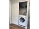 Convenient closet with washer and dryer hookups, featuring sliding doors for easy access at 247 E Cabarrus Ave, Concord, NC 28025