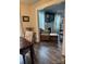 Open-concept view from dining area into the well lit living room with fireplace at 247 E Cabarrus Ave, Concord, NC 28025