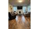 This spacious living room offers plenty of natural light and comfortable seating at 247 E Cabarrus Ave, Concord, NC 28025