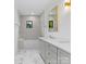 Bathroom featuring a shower-tub combo, single vanity, and natural light at 2608 Croydon Rd, Charlotte, NC 28209