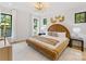 Bright bedroom features a plush bed, modern lighting, and neutral decor for a relaxing retreat at 2608 Croydon Rd, Charlotte, NC 28209