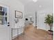 Inviting foyer features hardwood floors and an open view to the main living spaces at 2608 Croydon Rd, Charlotte, NC 28209