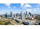 Stunning aerial view of the city skyline featuring modern architecture and beautiful blue skies at 2863 Grand Union Way, Charlotte, NC 28209