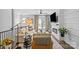 Bright living room boasting hardwood floors, neutral colors, a ceiling fan, a fireplace, and a comfortable sofa at 2863 Grand Union Way, Charlotte, NC 28209