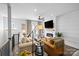 Cozy living room showcasing modern decor, hardwood floors, a fireplace, neutral colors, and stylish furnishings at 2863 Grand Union Way, Charlotte, NC 28209