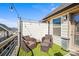 Stylish outdoor patio featuring comfortable seating, outdoor rug, privacy wall, and modern string lighting at 2863 Grand Union Way, Charlotte, NC 28209