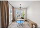 Bright sitting area with large windows, a modern chandelier, and cozy furnishings at 2863 Grand Union Way, Charlotte, NC 28209