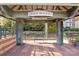 The Tremont covered sign with metal beams and a bench is a great place to take a break at 2863 Grand Union Way, Charlotte, NC 28209