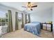 Bright bedroom with multiple windows, ceiling fan and carpet at 3029 Allendale Dr, Fort Mill, SC 29707
