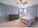 Spacious bedroom with neutral colored walls, ceiling fan, and carpet at 3029 Allendale Dr, Fort Mill, SC 29707