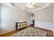 Well-lit dining room with tray ceiling, hardwood floors, and convenient access to other living areas at 3029 Allendale Dr, Fort Mill, SC 29707