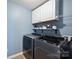Laundry room with a washer, dryer, and built-in cabinets at 3029 Allendale Dr, Fort Mill, SC 29707