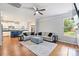 Open-concept living room with hardwood floors and seamless flow to the kitchen and dining areas at 3029 Allendale Dr, Fort Mill, SC 29707