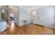 Stylish living room featuring hardwood floors, a work space, and neutral walls for versatile decorating at 3029 Allendale Dr, Fort Mill, SC 29707